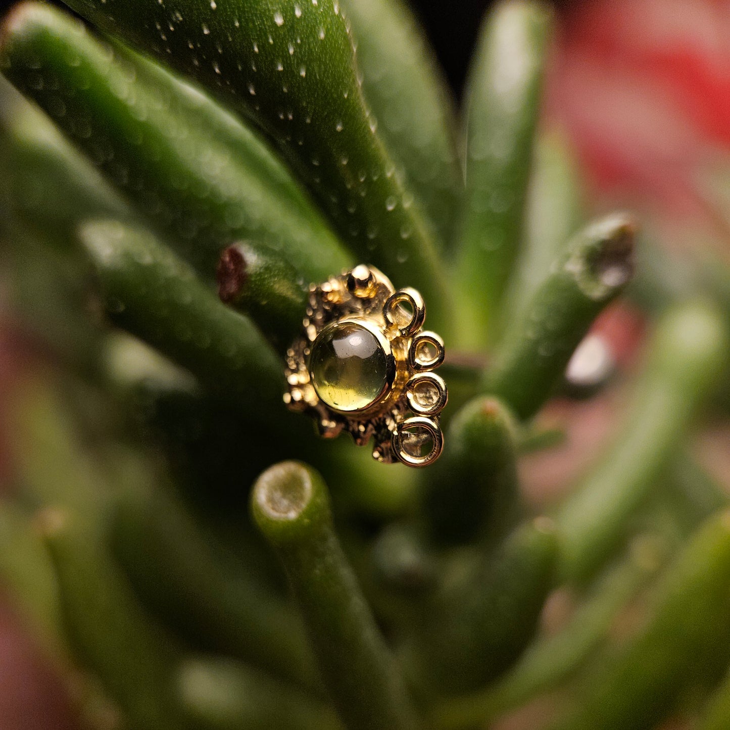 Abstract Art - peridot set in 14ct solid gold with 18ct decals- 14g threaded end.