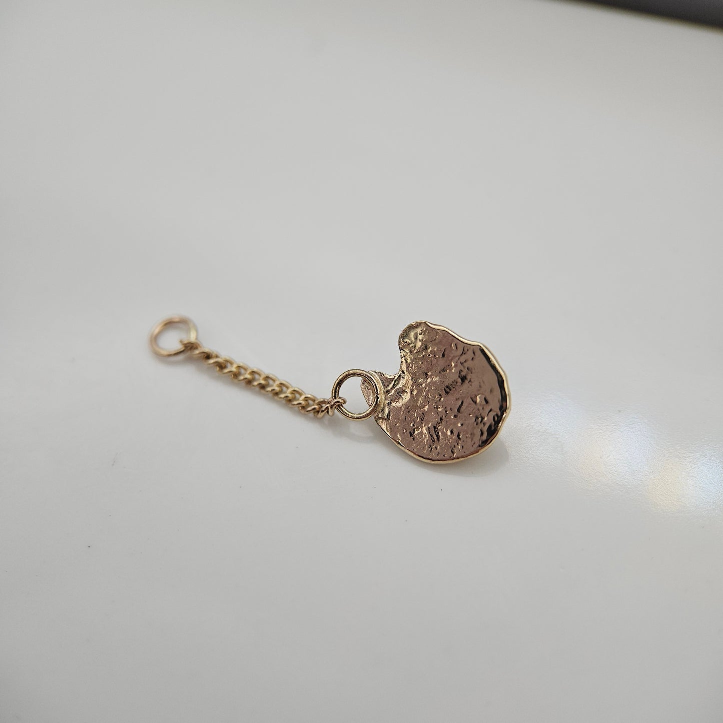 Ruby set in solid 9ct yellow gold - Charm