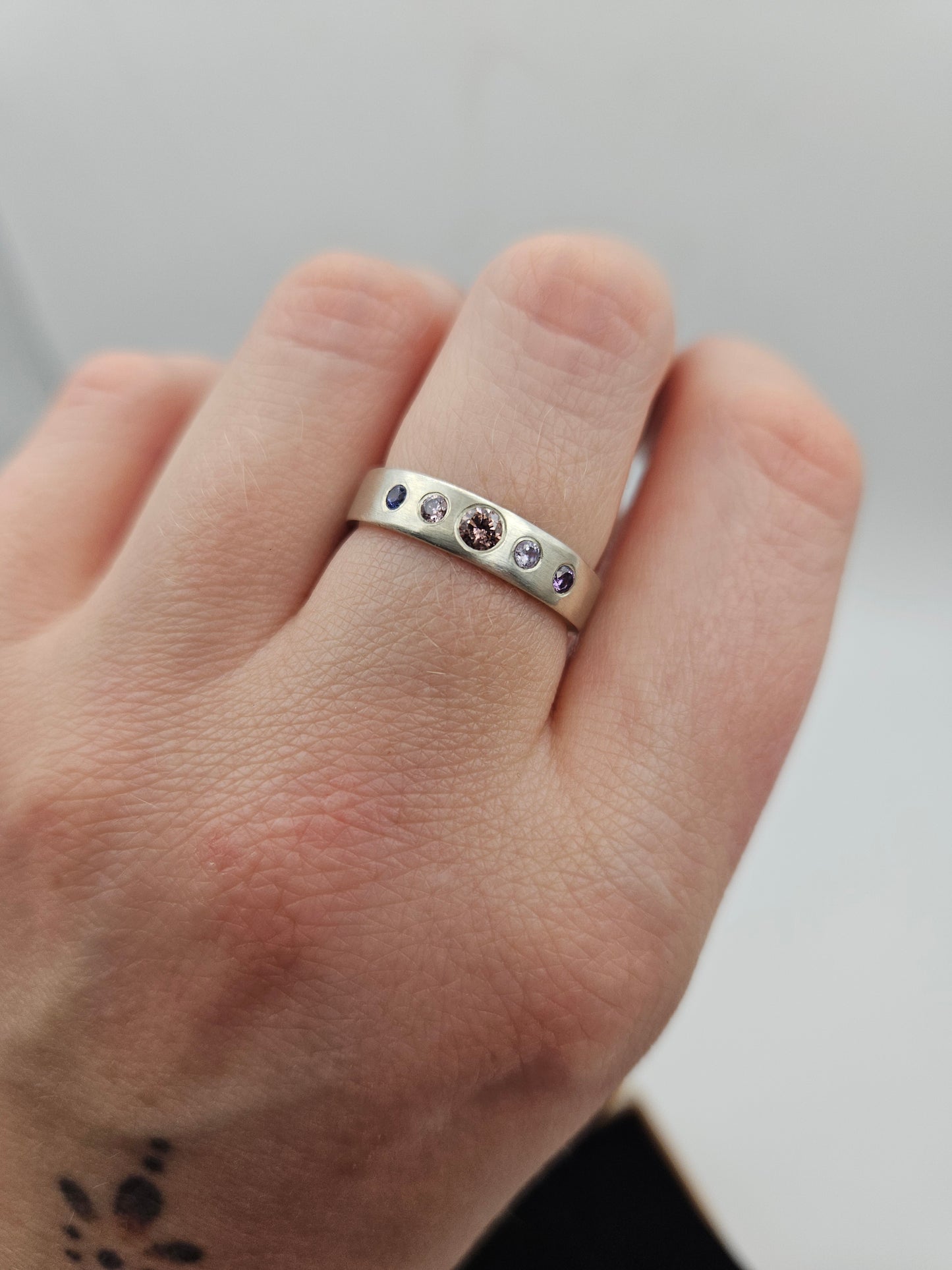 Brushed silver band with 5 flush set CZ- Size O (UK)