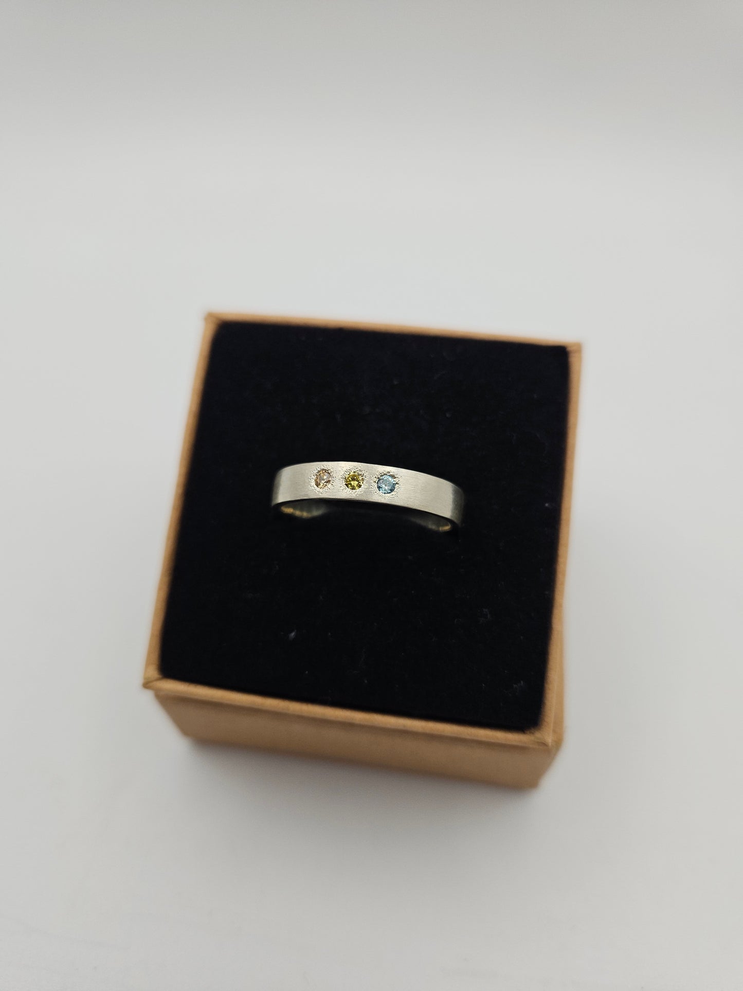 Brushed silver band with 3 flush set CZ- Size R