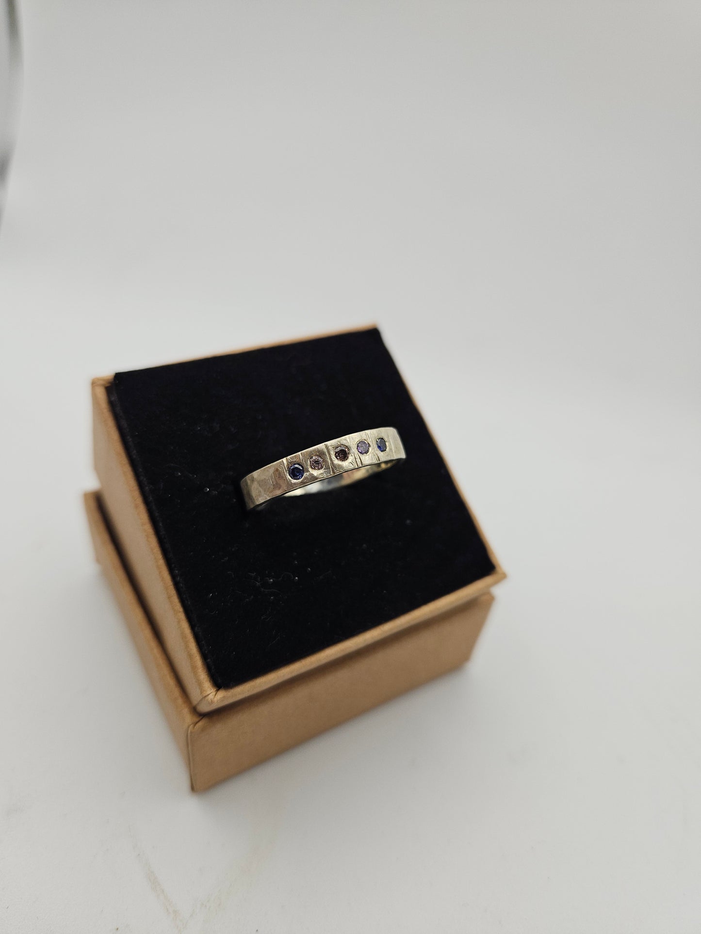 Hammered silver band with flush set CZ- Size S