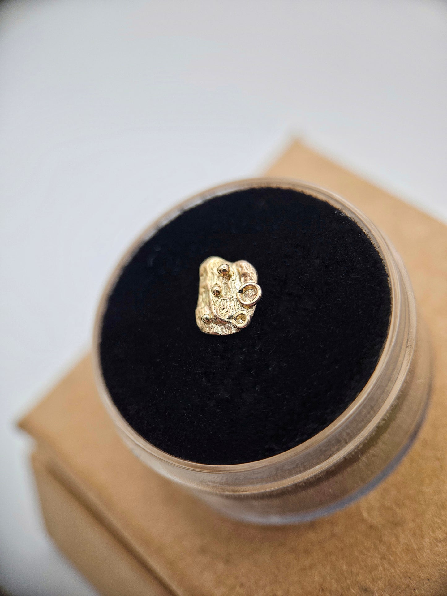 Abstract 1 - 9ct solid gold threadless end.