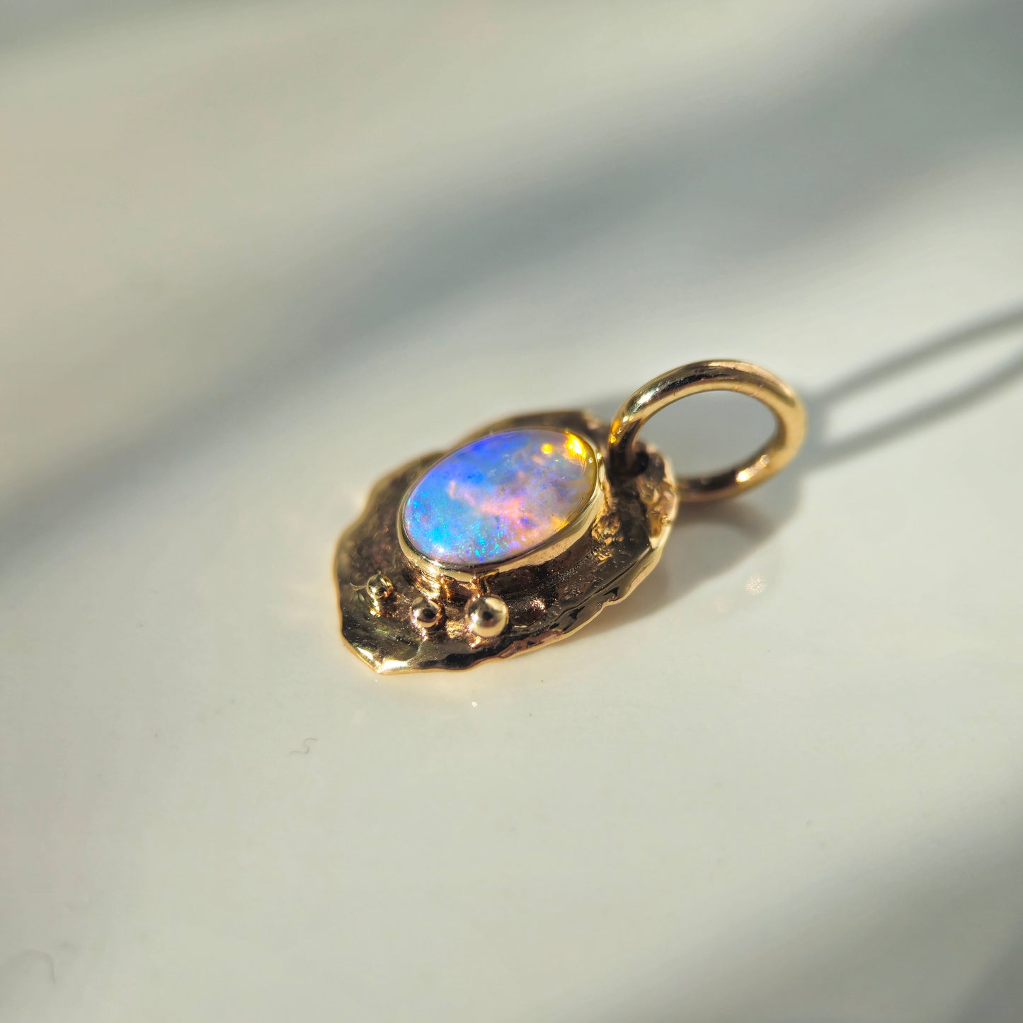 Opal set in solid 9ct yellow gold  - pendant