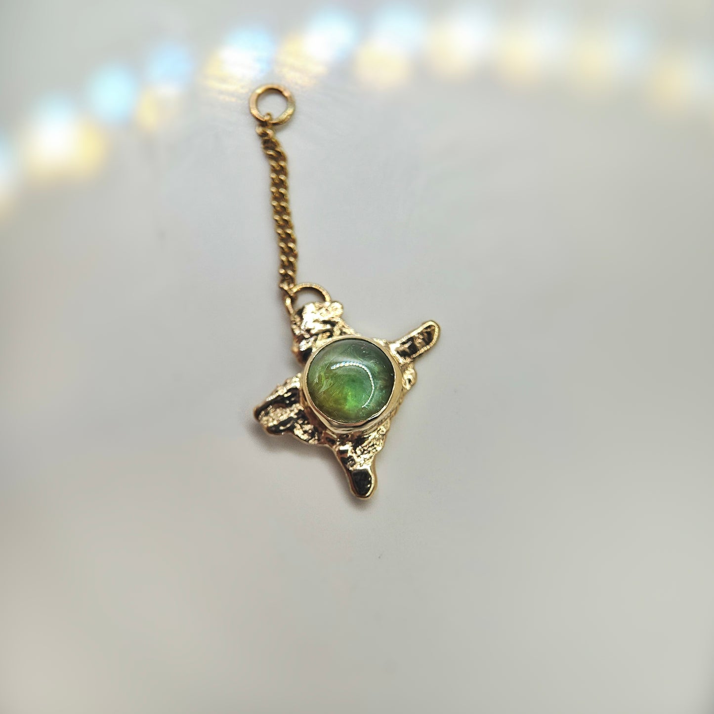 Green Paraiba Tourmaline set in solid 9ct yellow gold  - Charm