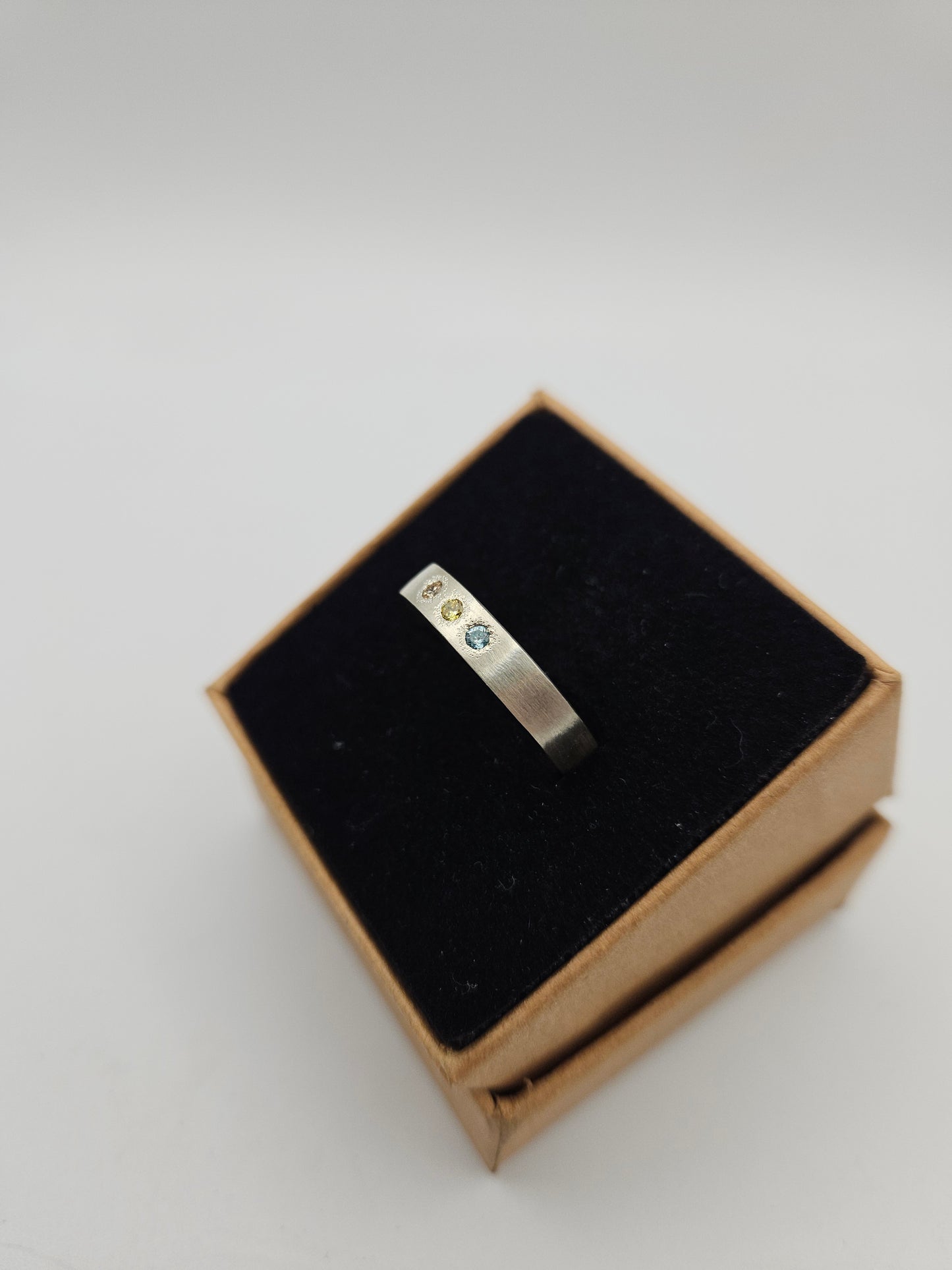 Brushed silver band with 3 flush set CZ- Size R