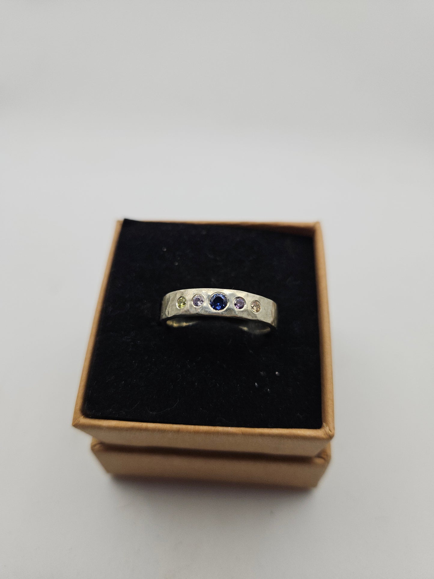 Hammered silver band with 5 flush set CZ- Size T