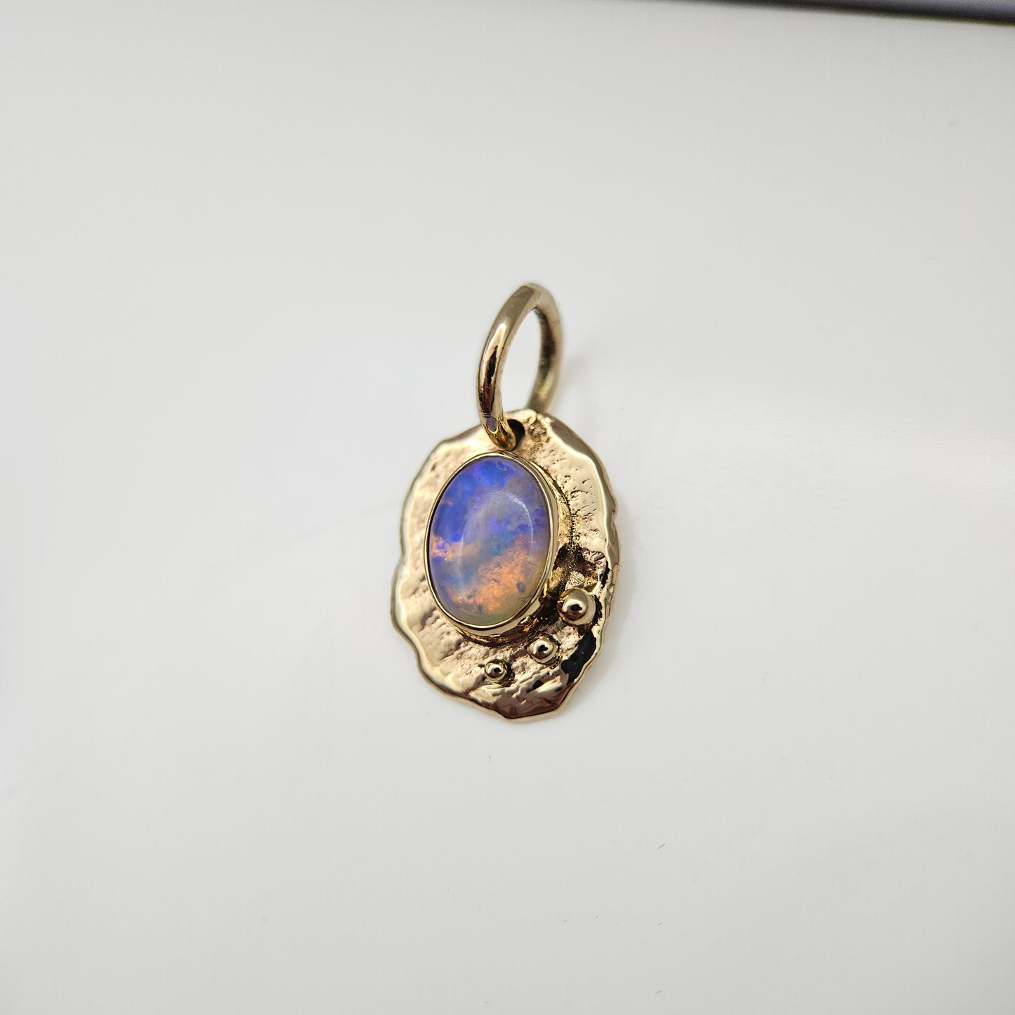 Opal set in solid 9ct yellow gold  - pendant
