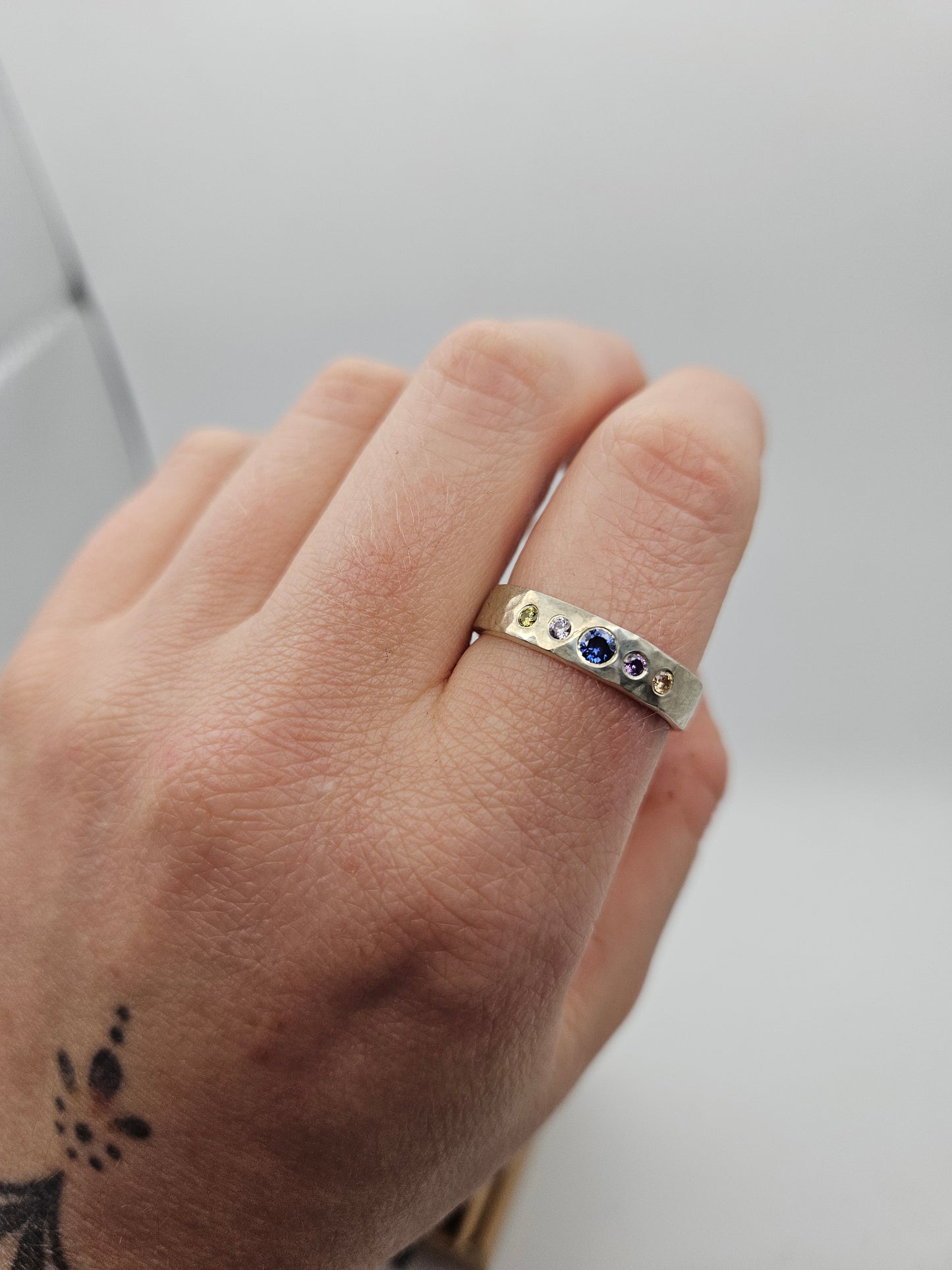 Hammered silver band with 5 flush set CZ- Size T