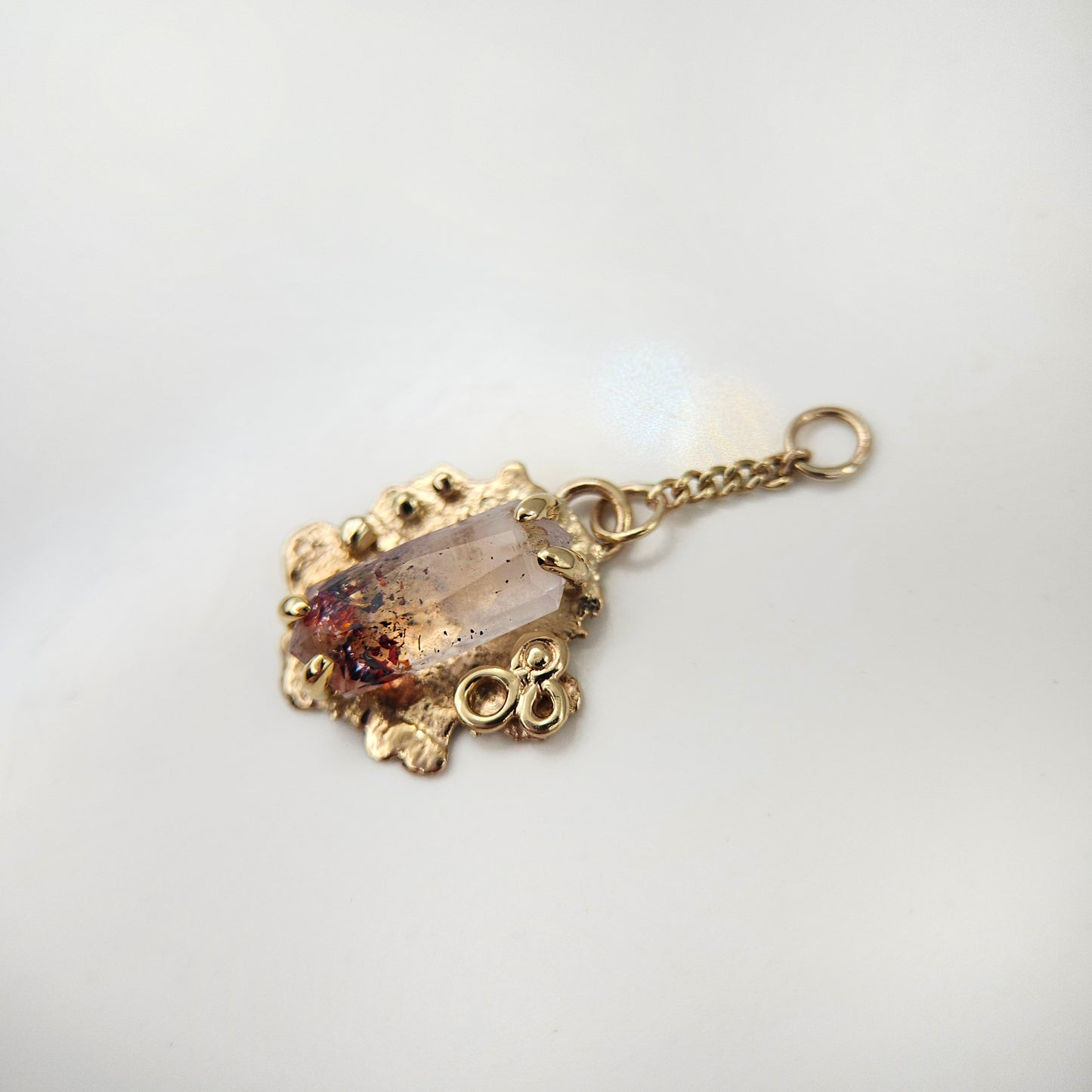 Disco fire quartz set in solid 9ct yellow gold  - Charm