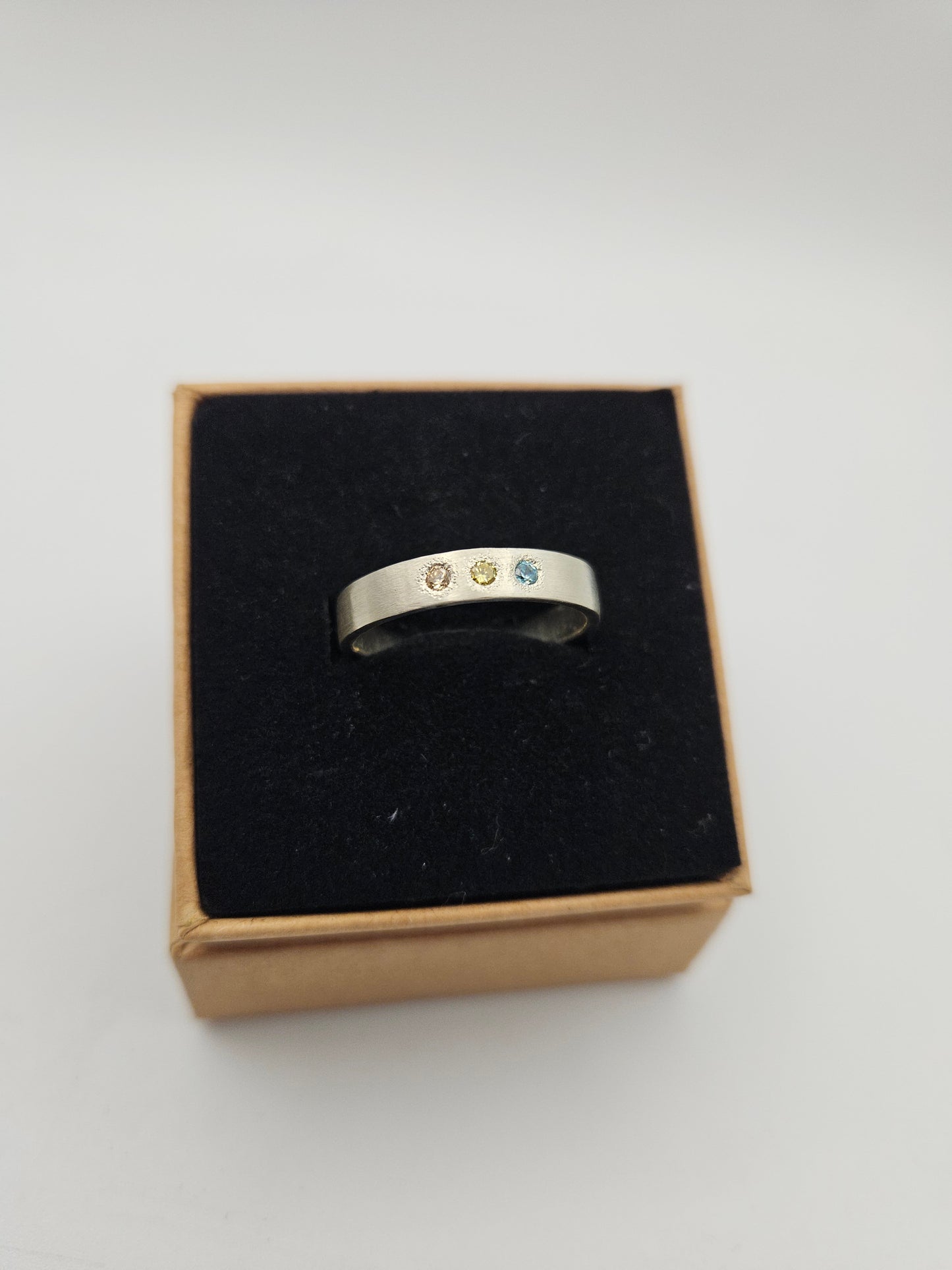 Brushed silver band with 3 flush set CZ- Size R