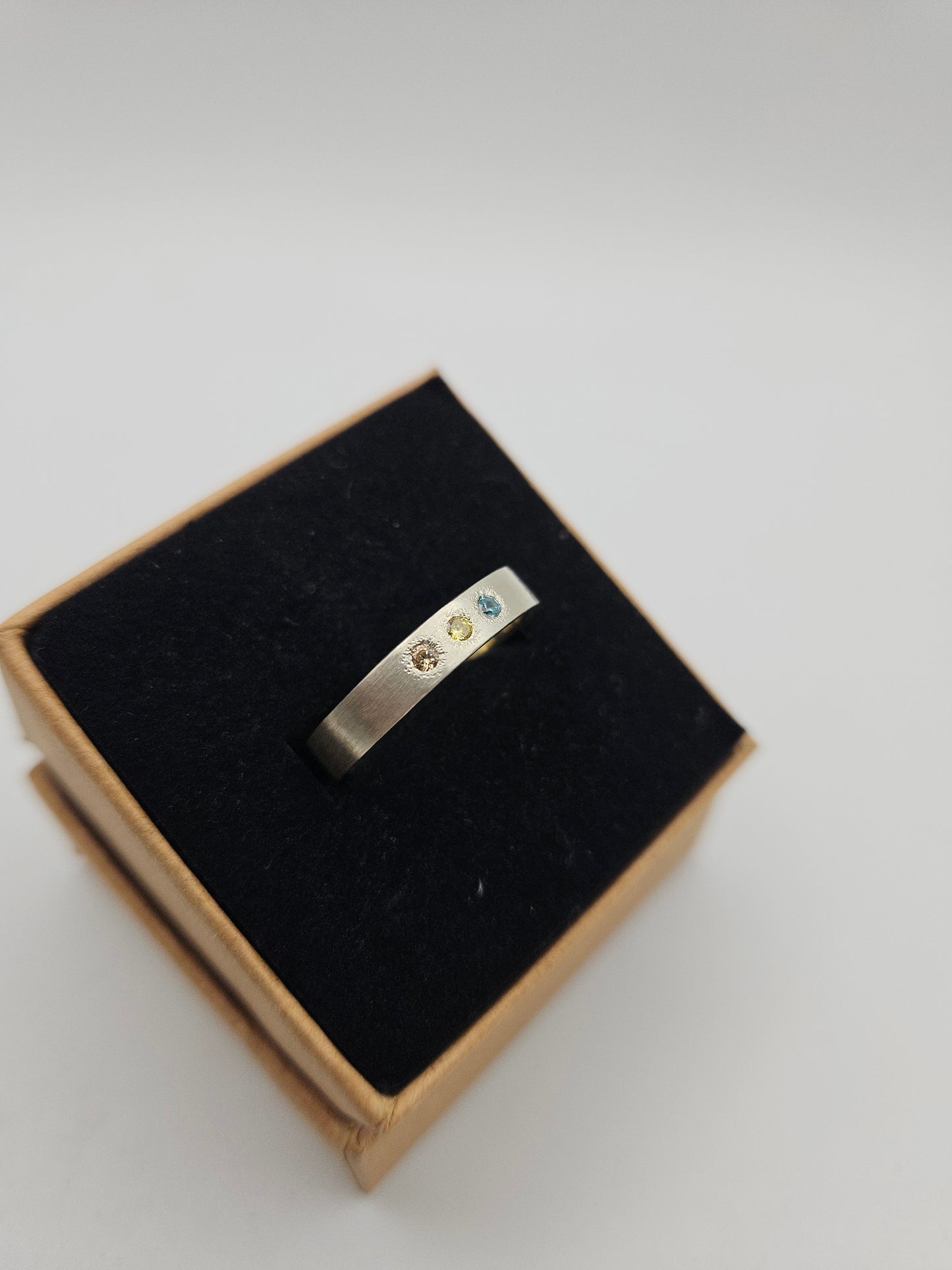 Brushed silver band with 3 flush set CZ- Size R