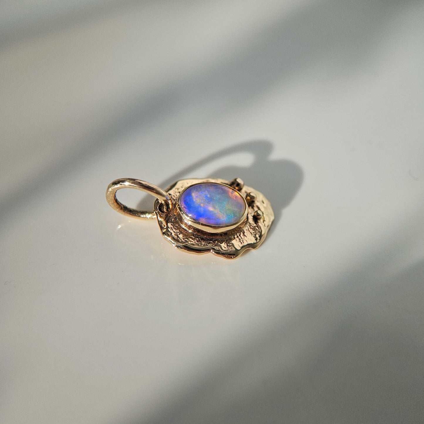 Opal set in solid 9ct yellow gold  - pendant