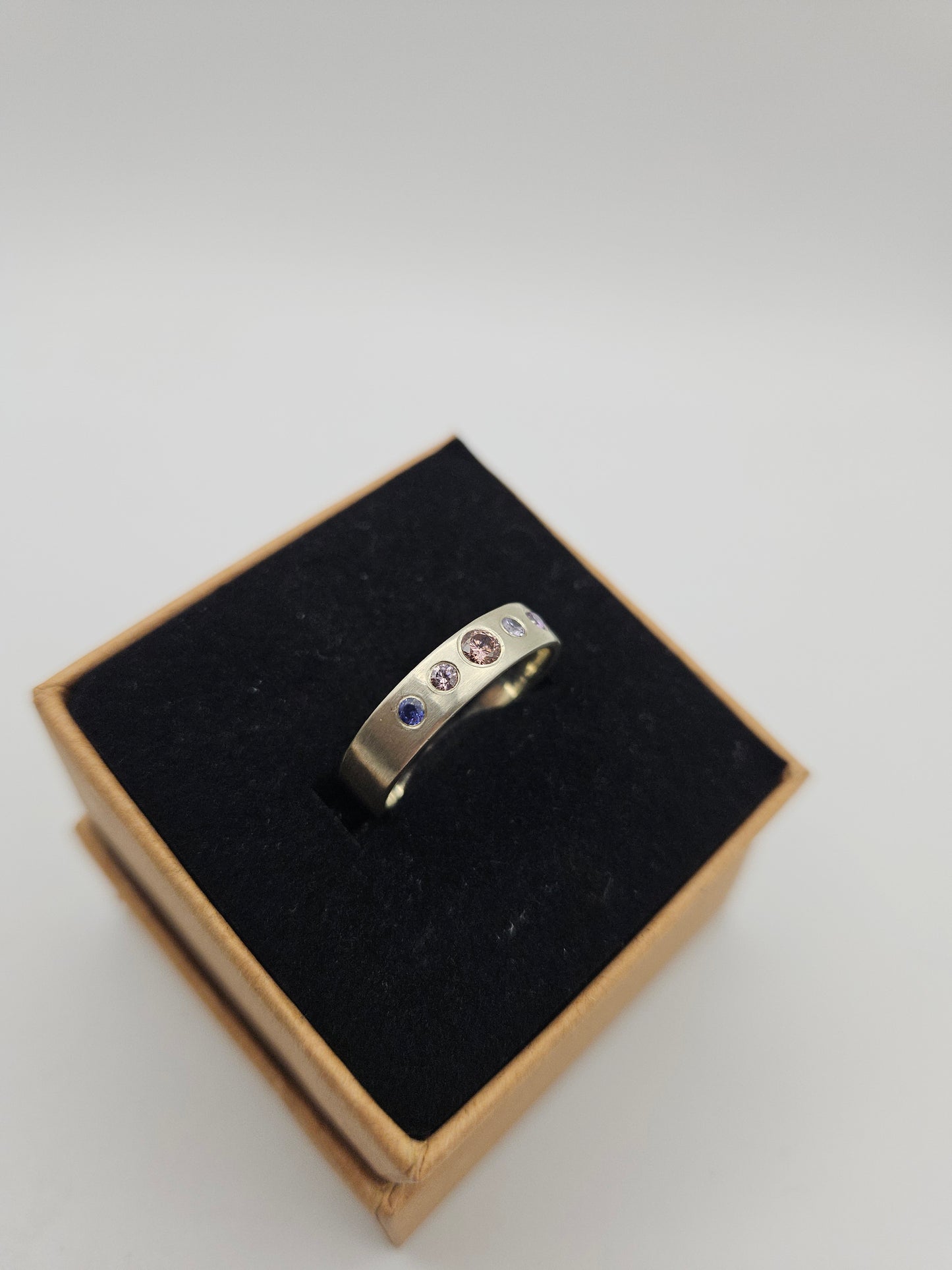 Brushed silver band with 5 flush set CZ- Size O (UK)
