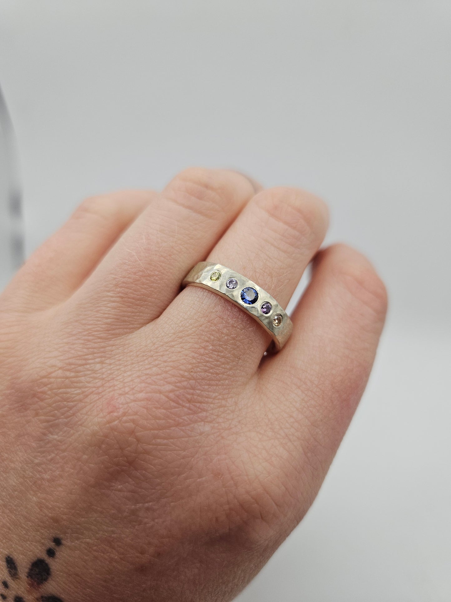 Hammered silver band with 5 flush set CZ- Size T