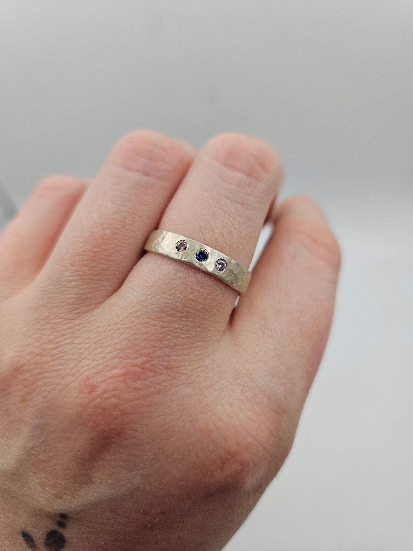Hammered silver band with 3 flush set CZ- Size P