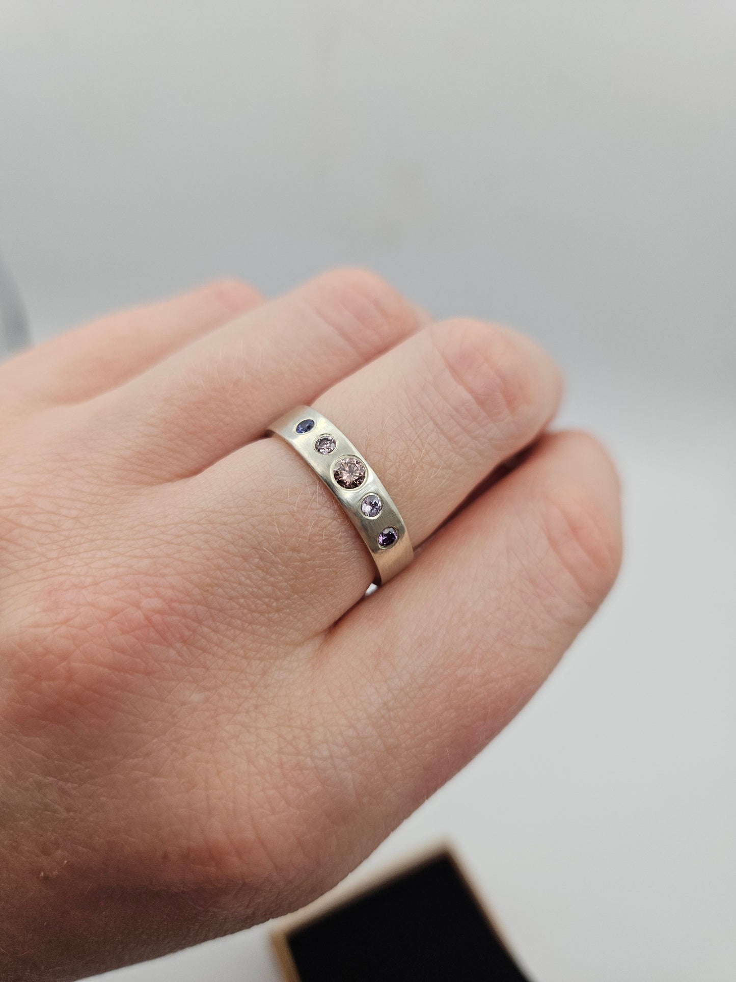 Brushed silver band with 5 flush set CZ- Size O (UK)