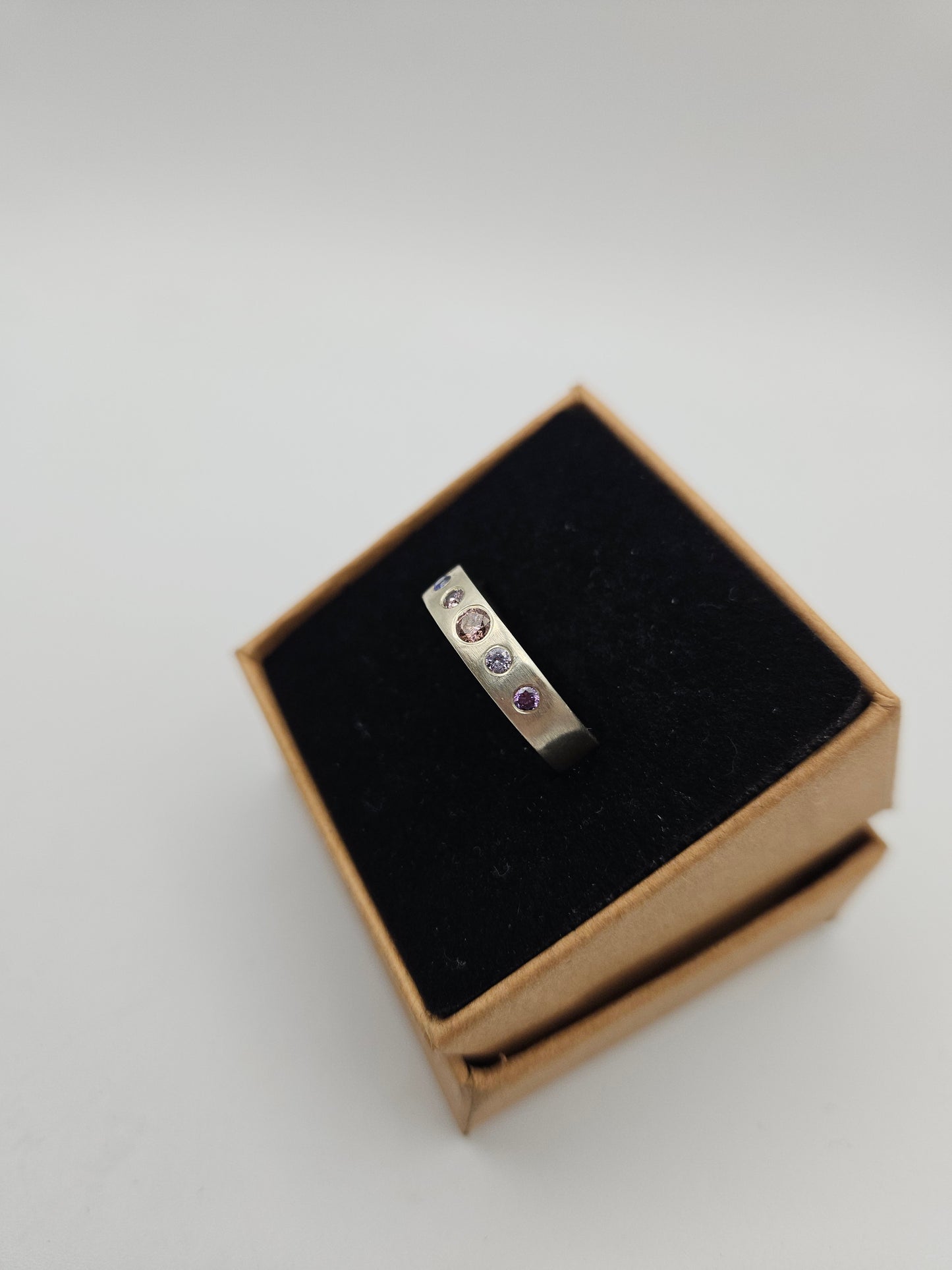 Brushed silver band with 5 flush set CZ- Size O (UK)