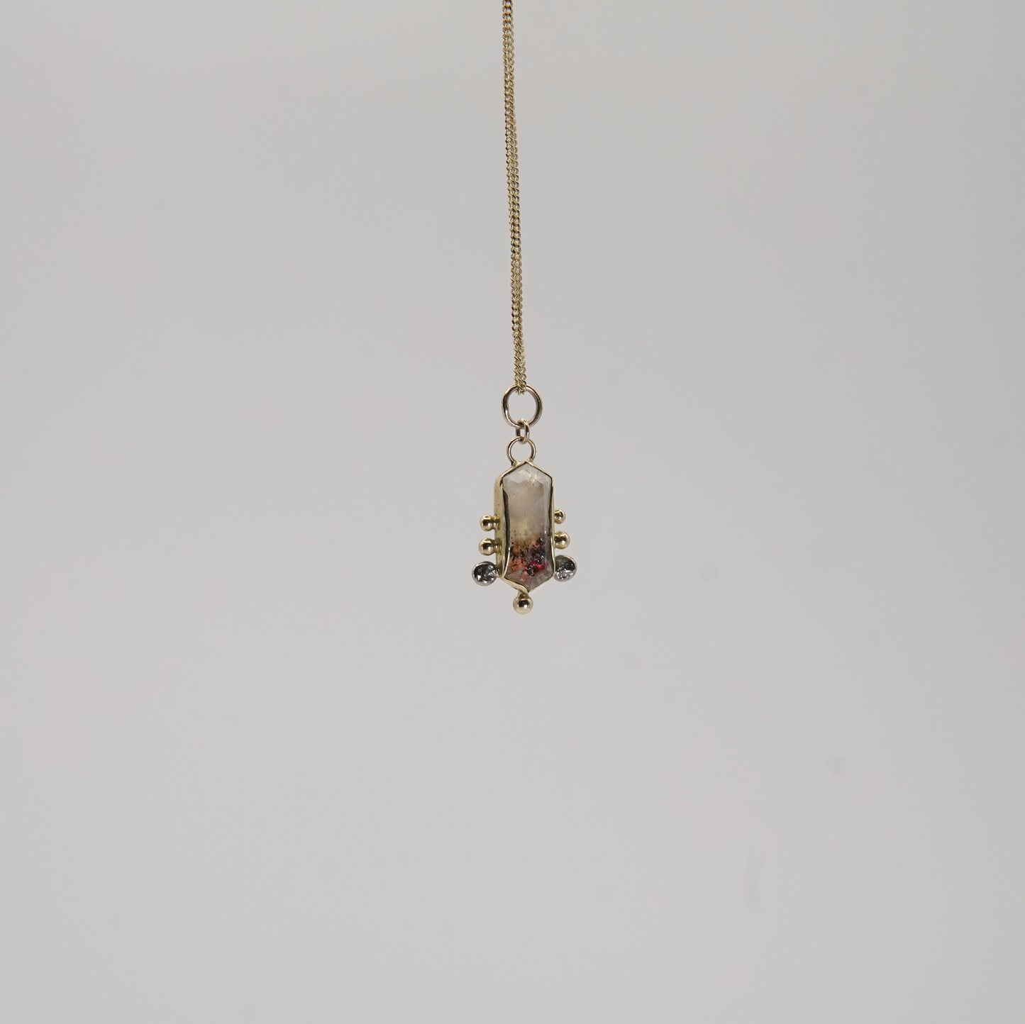 Disco fire quartz set in solid 18ct yellow gold with white gold dots  - Charm