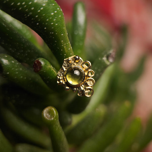 Abstract Art - peridot set in 14ct solid gold with 18ct decals- 14g threaded end.