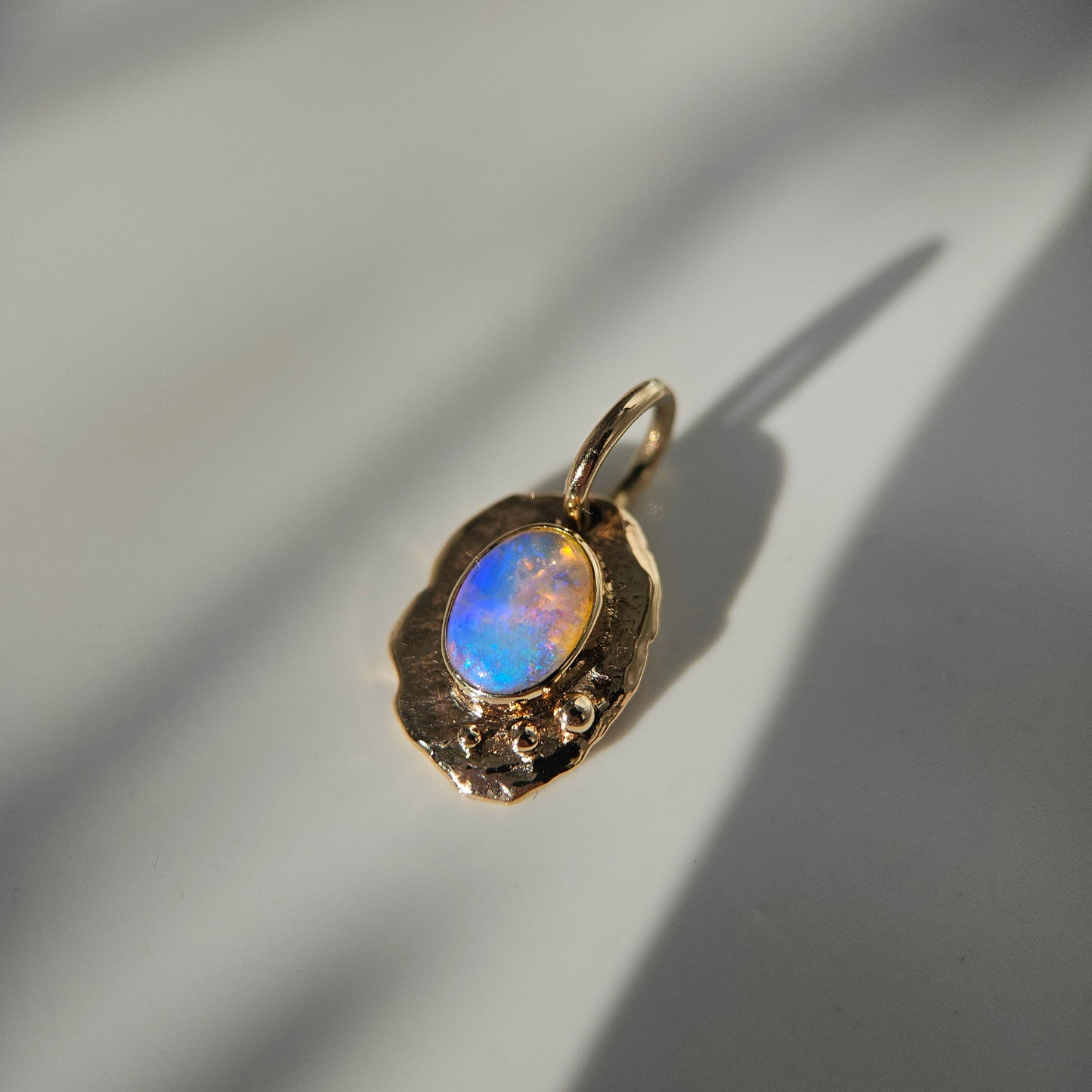 Opal set in solid 9ct yellow gold  - pendant