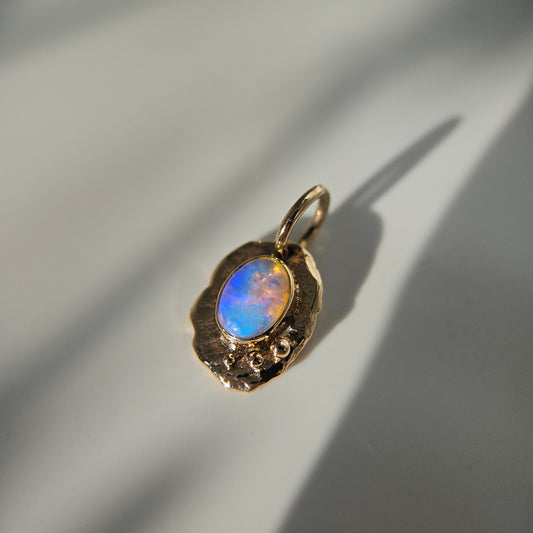 Opal set in solid 9ct yellow gold  - pendant