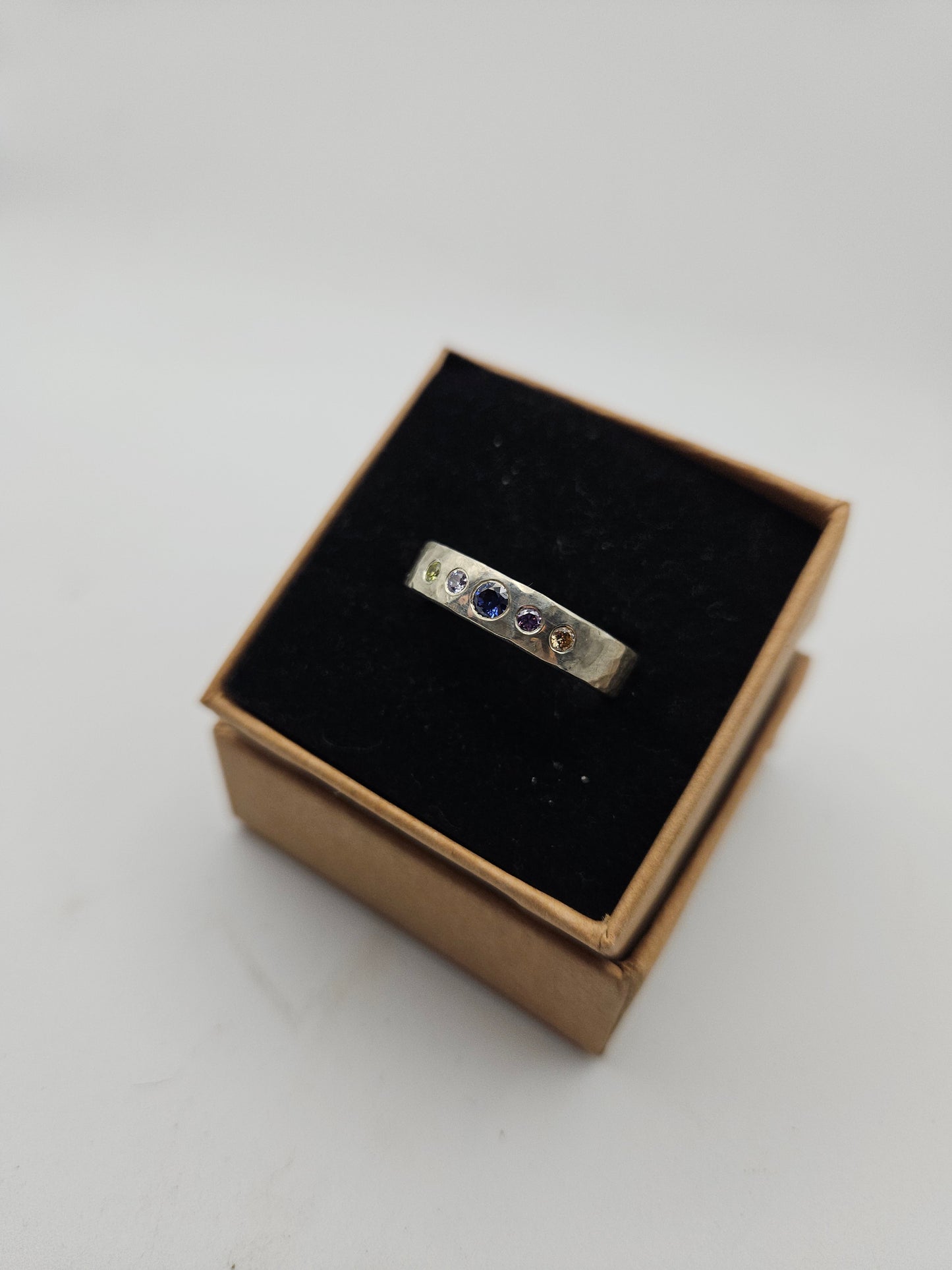 Hammered silver band with 5 flush set CZ- Size T